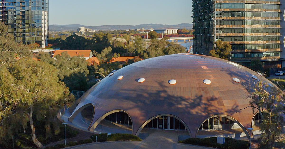 Shine Dome aerial with city background